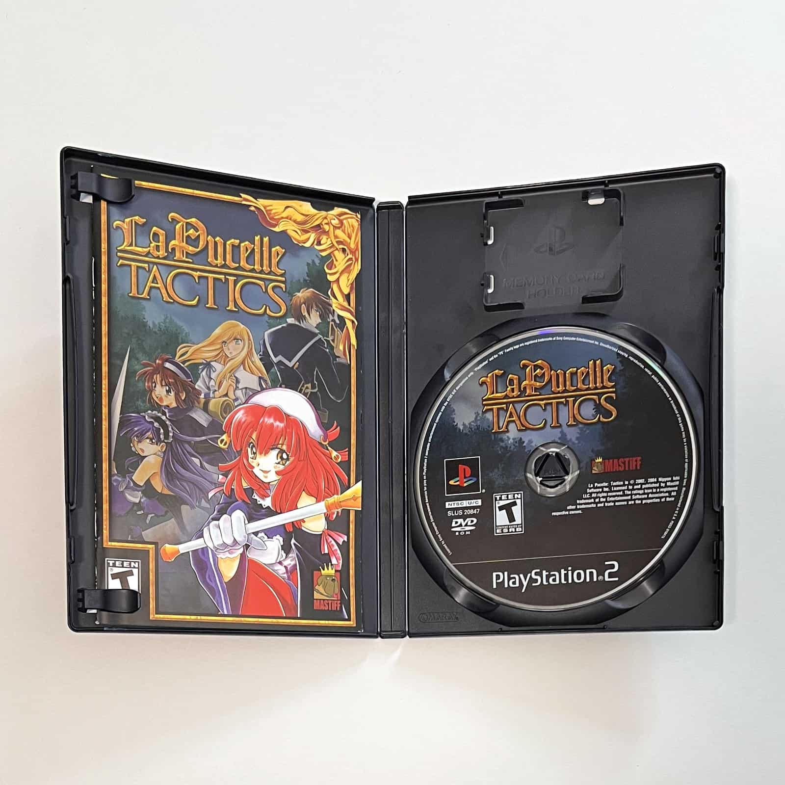 La Pucelle: Tactics PS2 case open with disc and manual