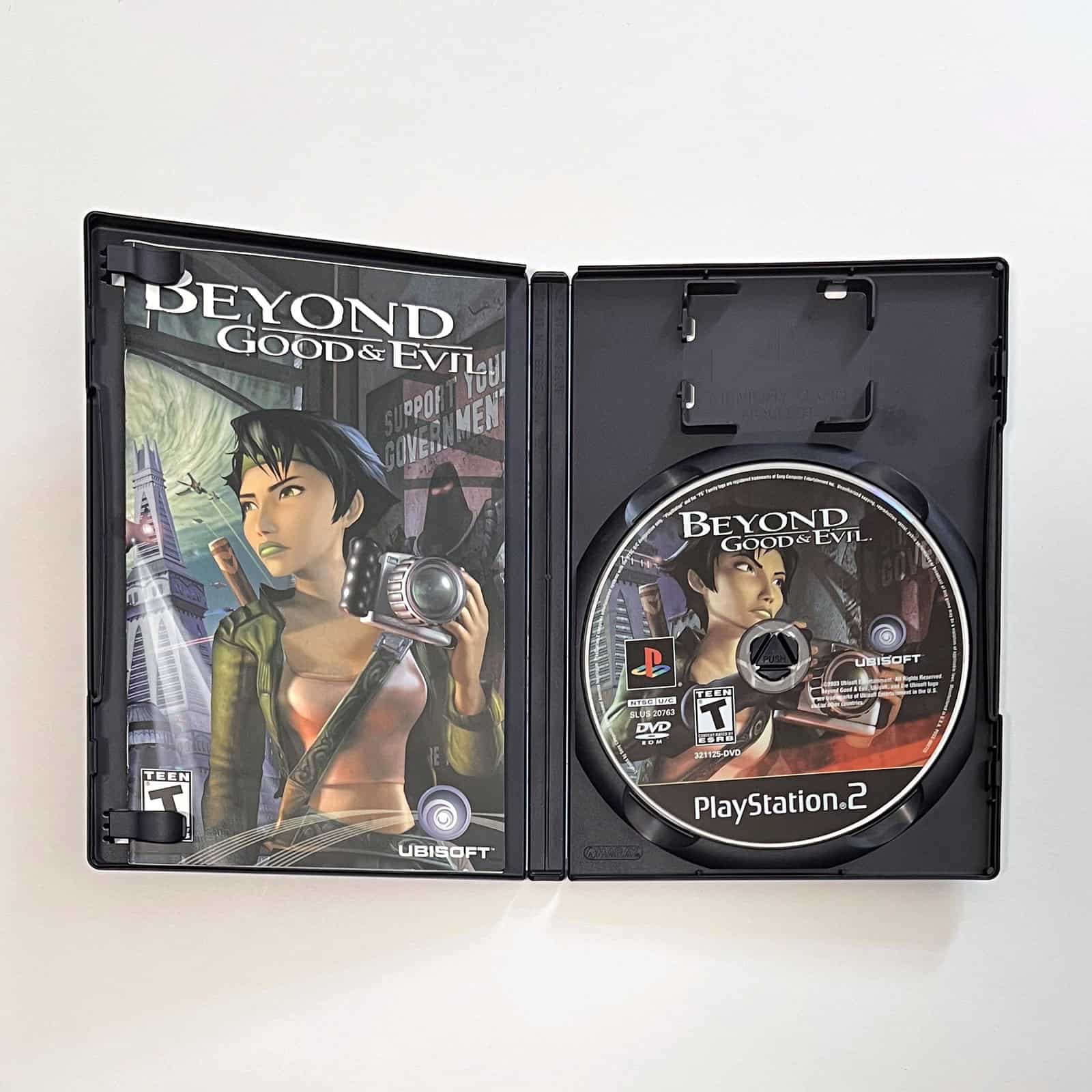 Beyond Good & Evil PS2 case open with disc and manual