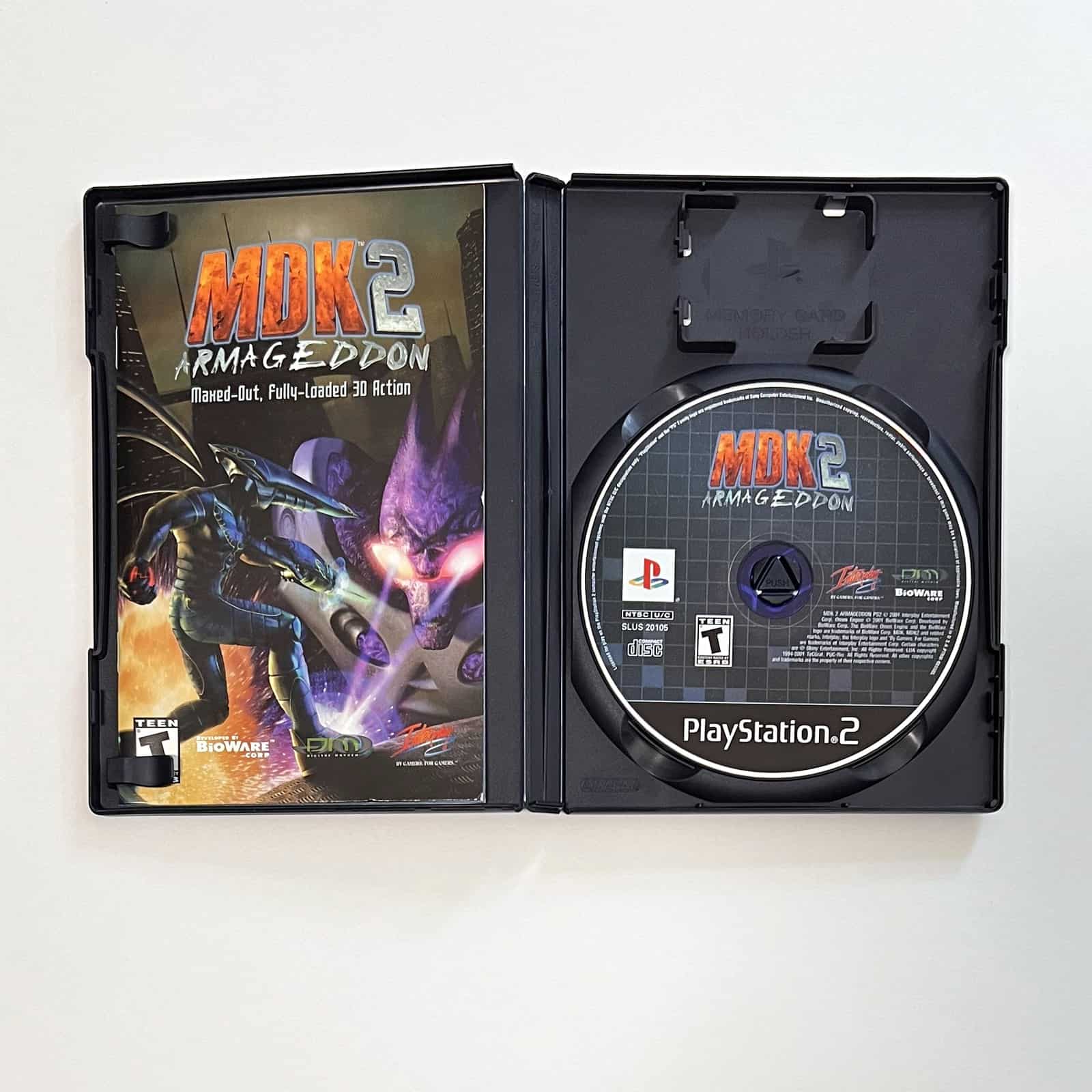MDK2 Armageddon PS2 case open with disc and manual