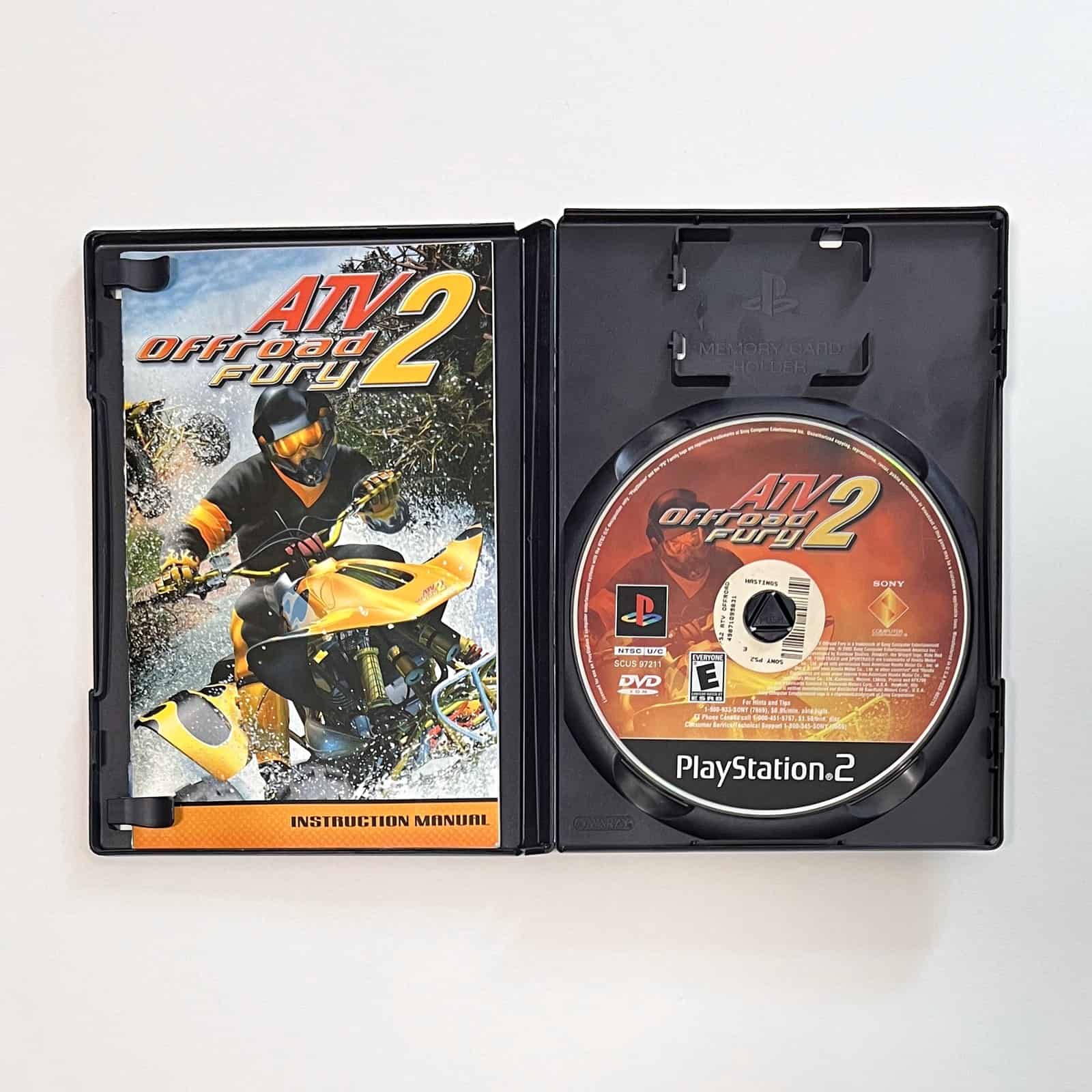 ATV Offroad Fury 2 PS2 case open with disc and manual