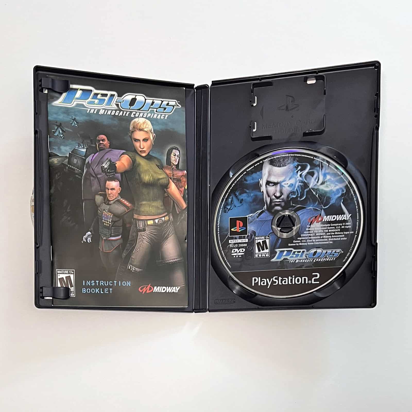 Psi-Ops: The Mindgate Conspiracy PS2 case open with disc and manual